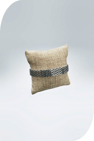 Candor Mesh Link Bracelet displayed on a cushion, showcasing its elegant design from Aly + Lia Boutique.