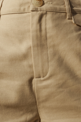 a close up of a person's High Waist Linen Shorts with buttons