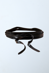 a black leather belt with a loop of black leather
